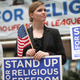Religious freedom supporters hold a rally to praise the Supreme Court’s decision in the Hobby Lobby, contraception coverage requirement case on June 30, 2014 in Chicago, Illinois.